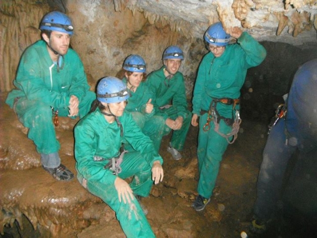 Group of friends in a cave 